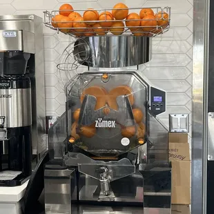 a machine with oranges on it