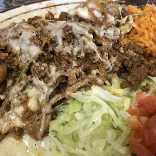 Lunch special Chili Relleno, already cut up. Sauce on side. Good without. Or ask for white $