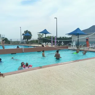 Not a lot of space if people are playing volleyball here