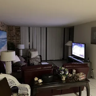 Living area. Blinds are a mess.