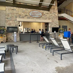 the bar and lounge chairs