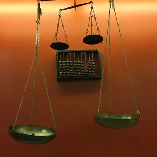 a balance scale and a clock