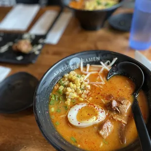 a bowl of ramen with an egg