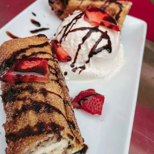 banana chimichanga with ice cream and strawberries
