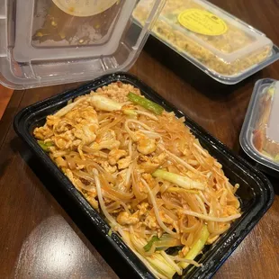 a tray of noodles and vegetables