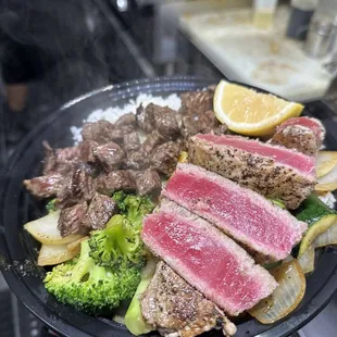 a person holding a plate of food