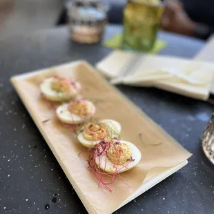 a plate of deviled eggs