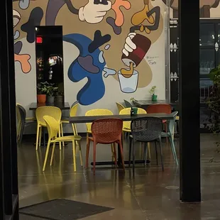 a mural of cartoon characters on a wall