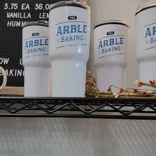 coffee mugs on a shelf