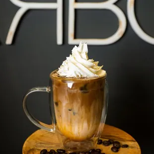 a cup of coffee with whipped cream