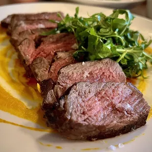 Steak with roasted carrot romesco, arugula &amp; herb salad