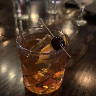 an old fashioned cocktail in a glass