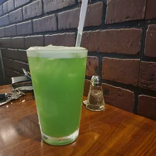 a green drink on a table