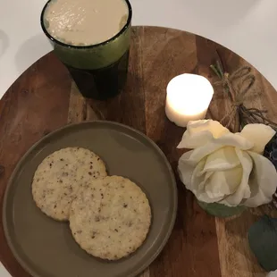 a plate of cookies and a glass of milk