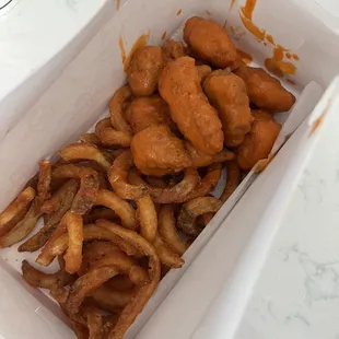 9 piece boneless Buffalo wings with curly fries