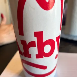 a cup of coffee on a table