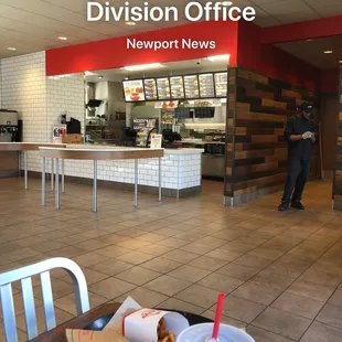 One worker on his phone while the other works his butt off...