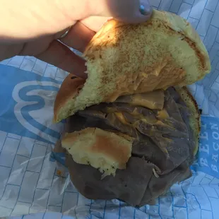 "Beef and Cheddar Sandwich." This is how it was given to me. I had not taken a bite yet, the bun was in pieces when I got it.