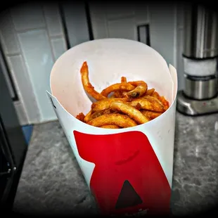 Curly Fries (Large) filled only 2/3&apos;s of the way. And no, there were no bottom bag fries.