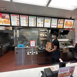 a man and a woman in a fast food restaurant