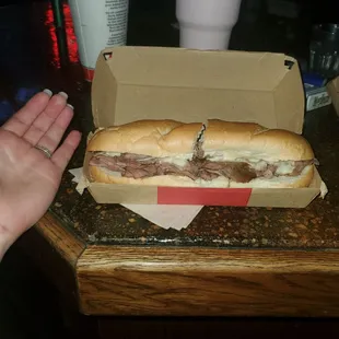 A dry sandwich with no French dip... thats what is in this photo