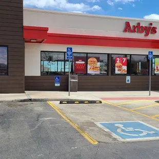 a car parked in front of a restaurant