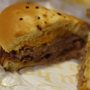 a beef sandwich cut in half