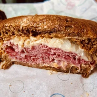 a sandwich with meat and cheese