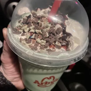 Chocolate mint shake with crumble bits of chocolate mint candy and chocolate sauce on the top!