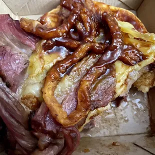 $7 Smokehouse Brisket Sandwich with little meat and 2 onion straws !