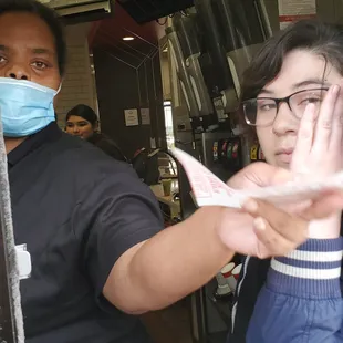 a man and a woman wearing face masks