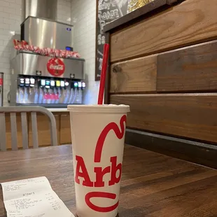 a paper cup on a table