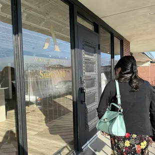 Entrance (behind barber shop)