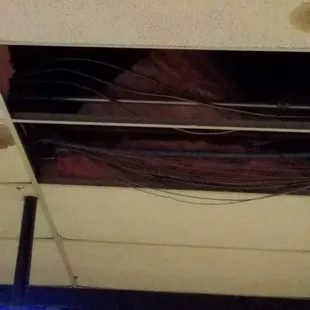 Yep that's legal, wires exposed and hanging down