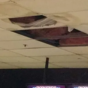 Ceiling tiles missing and exposed