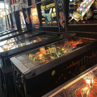 a row of pinball machines
