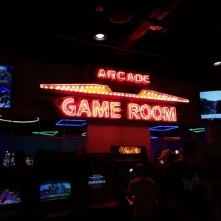 a neon sign for a game room