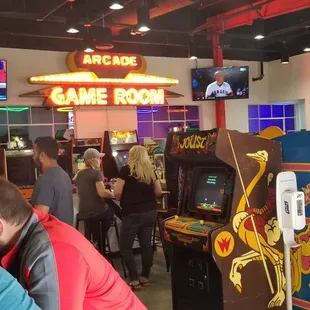a crowd of people playing video games