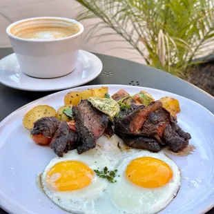 Steak + Eggs | skirt steak, olive oil potatoes, cherry tomato, watercress, green onion butter, fried eggs