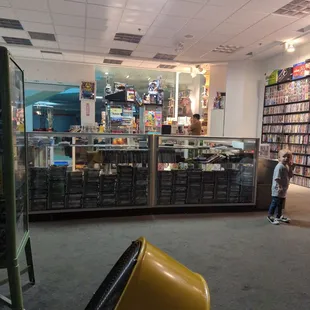 The vintage items for sale in the arcade space.