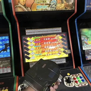 Replaced the failing GD-ROM drive in our Capcom vs SNK 2 machine!