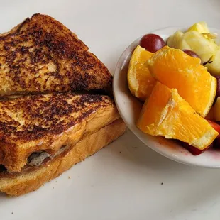 PB and Banana Sandwich with bacon added and a side of fruit