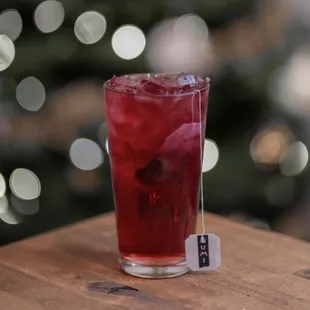 Cranberry Hibiscus Tea is here to brighten your day Made with a refreshing hibiscus lion's mane tea and a splash of cranberry