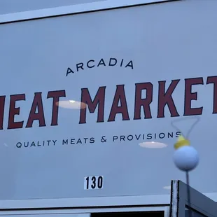 a sign for the meat market