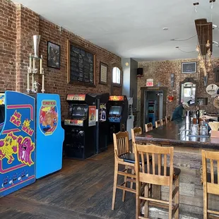 a bar with arcade machines