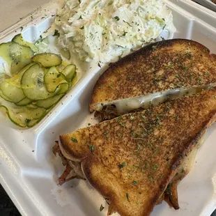 The Mr. Pig Stuff grilled cheese with pulled pork, slaw and house made pickles