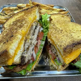 Weekly burger special:  Double grilled cheese bacon double cheese smashburger and fries