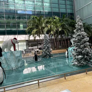 a group of penguins and a polar bear