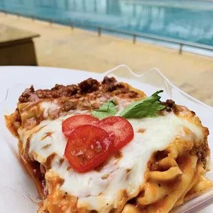 a slice of lasagna on a plate