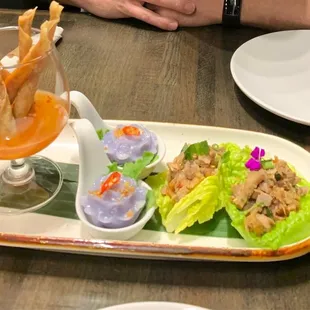 Combination app. Duck lettuce wrap , specialty dumpling, and crispy prawn and taro rolls. Everything was so good